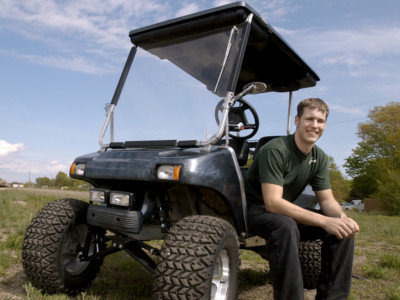 a man sitting on a tractor